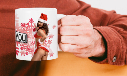 Sexy christmas mug with the girl in the hand