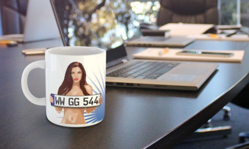 Sexy mug by a laptop