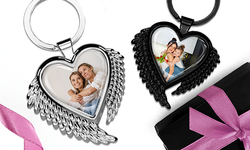 Heart-shaped keychain with wings and a photo of your mother