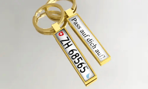 Goldfarbene Metall-Schlüsselanhänger mit individuellem Kennzeichen und Gravur