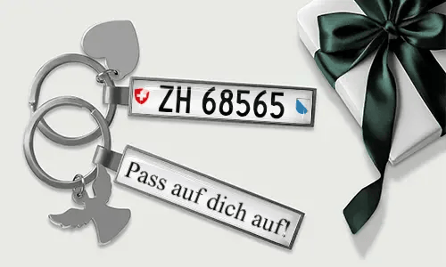 Personalized license plate keychain with heart and wing charms