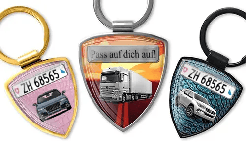 Shield-shaped photo keychain with car and truck designs