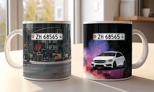 Two white mugs with car-themed prints: red BMW in urban setting, white Mercedes with sparks and colorful background