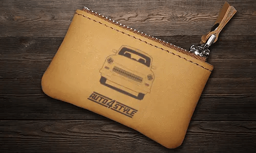 Brown leather key pouch with zipper, printed car and plate 