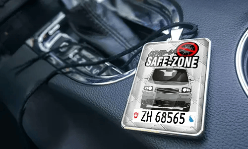 Auto-Safezone-Anhänger mit Weiß Leder Hintergrund im Wagen Auto-Safezone-Anhänger